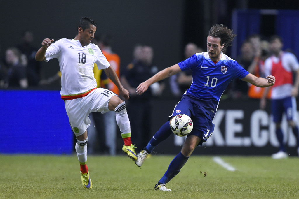 Pictured Luis Montes (MX) and Mix Diskerud (US) to play in FS1 USA v Mexico (Credit: Robin Alam/ISI Photos)